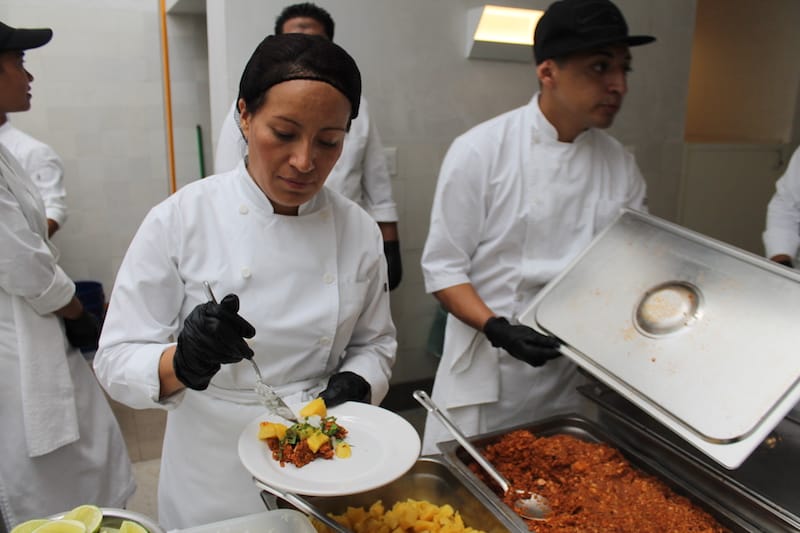 Barracuda staff serve fresh fish and meat dishes, photo by Martha Pskowski
