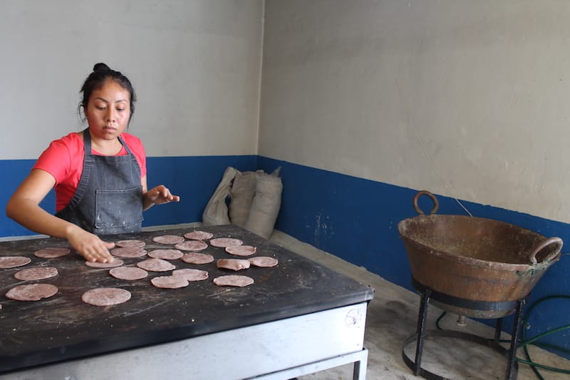 Laura Garcia prepares blue corn tortillas at Maizajo, photo by Martha Pskowski