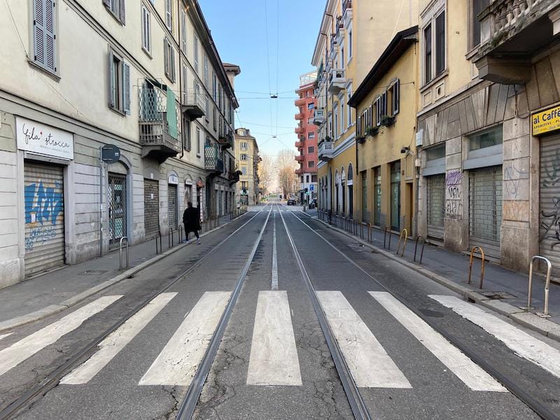 An empty street in Milan under lockdown, photo by Todd Reichlmayr