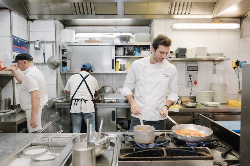 Chef Giuliano in the kitchen of Mimi alla Ferrovia, photo by Carlo Rainone