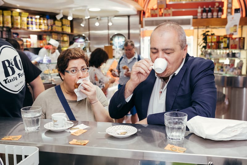 Neapolitans drink their coffee at Caffè Mexico after placing their coupons and tips on the counter, photo by Carlo Rainone