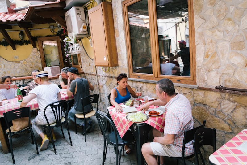 Customers have lunch at Cantina del Gallo, photo by Gianni Cipriano and Sara Smarrazzo