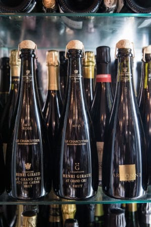 Bottles of Champagne at Caseari Cautero in Naples, photo by Gianni Cipriano and Sara Smarrazzo