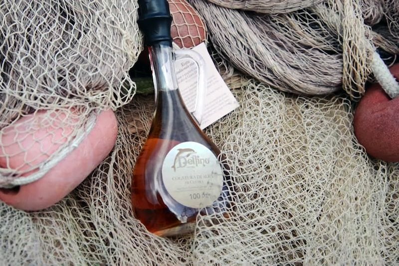 A bottle of Delfino Battista's colatura di alici, photo by Delfino Battista