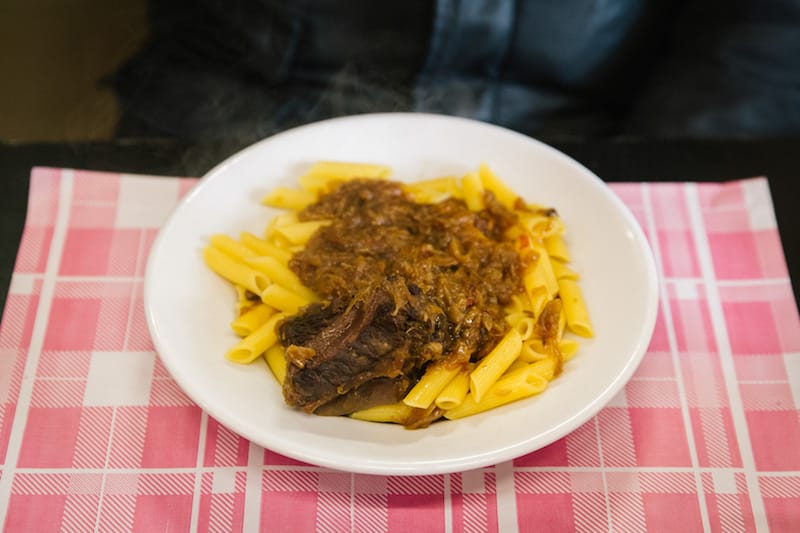 Pasta alla Genovese made with penne pasta at Trattoria Malinconico, photo by Gianni Cipriano and Sara Smarrazzo