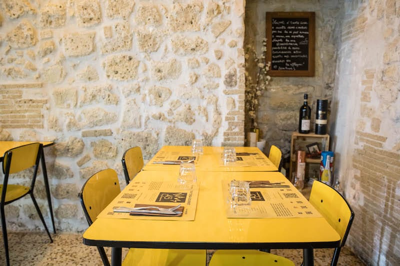 The tables and chairs at NAM 43 came from a school canteen in Emilia-Romagna, photo by Gianni Cipriano and Sara Smarrazzo