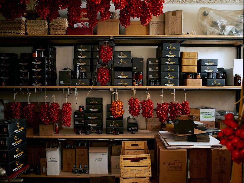 Piennolo tomatoes must be well aged, first stored in boxes and then hung in bunches, photo by Peter Mayr