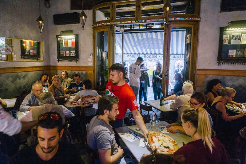 The bustling dining room of Pizzeria Gino Sorbillo, photo by Gianni Cipriano and Sara Smarrazzo