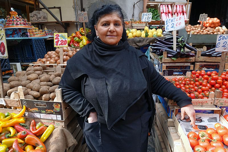 A market vendor in Naples, photo by Ansel Mullins