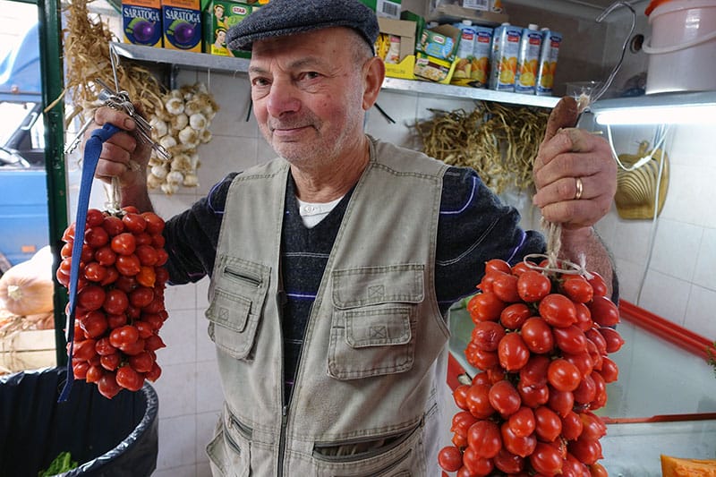 Pummarola ro piennolo (hanging tomatoes), an essential ingredient in many Neapolitan dishes, photo by Ansel Mullins