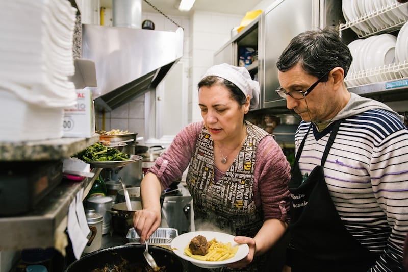 Marianna Sorrentino prepares pennette with Genovese sauce at Trattoria Malinconico, photo by Gianni Cipriano and Sara Smarrazzo
