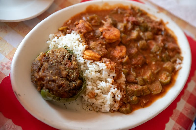 Smothered shrimp and okra with stuffed bell pepper, photo by James Cullen