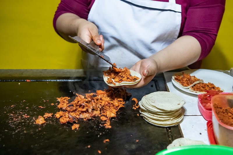 Preparing tacos at Taquería el Gran Pastor, photo by Jalil Olmedo