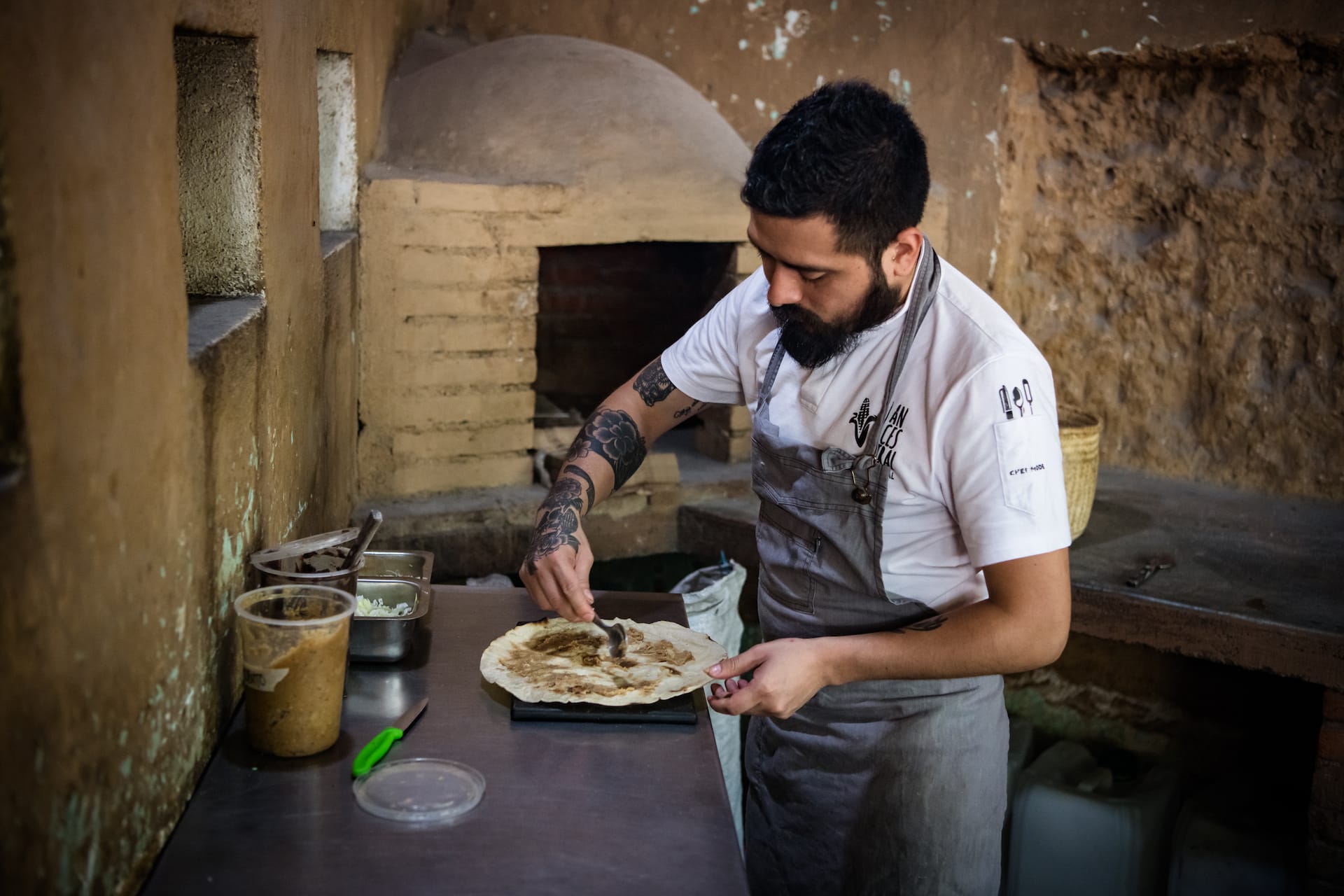 man making tlayudas