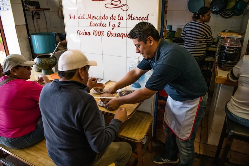 Breakfast being served in Oaxaca’s Merced market, photo by Jalil Olmedo