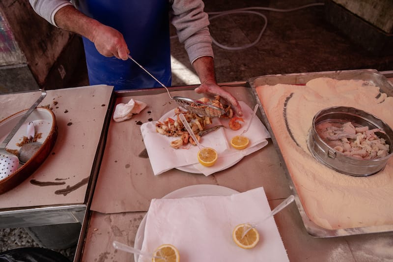 Fresh fried fish at Da Andrea in Palermo’s Vucciria market, photo by Francesco Cipriano