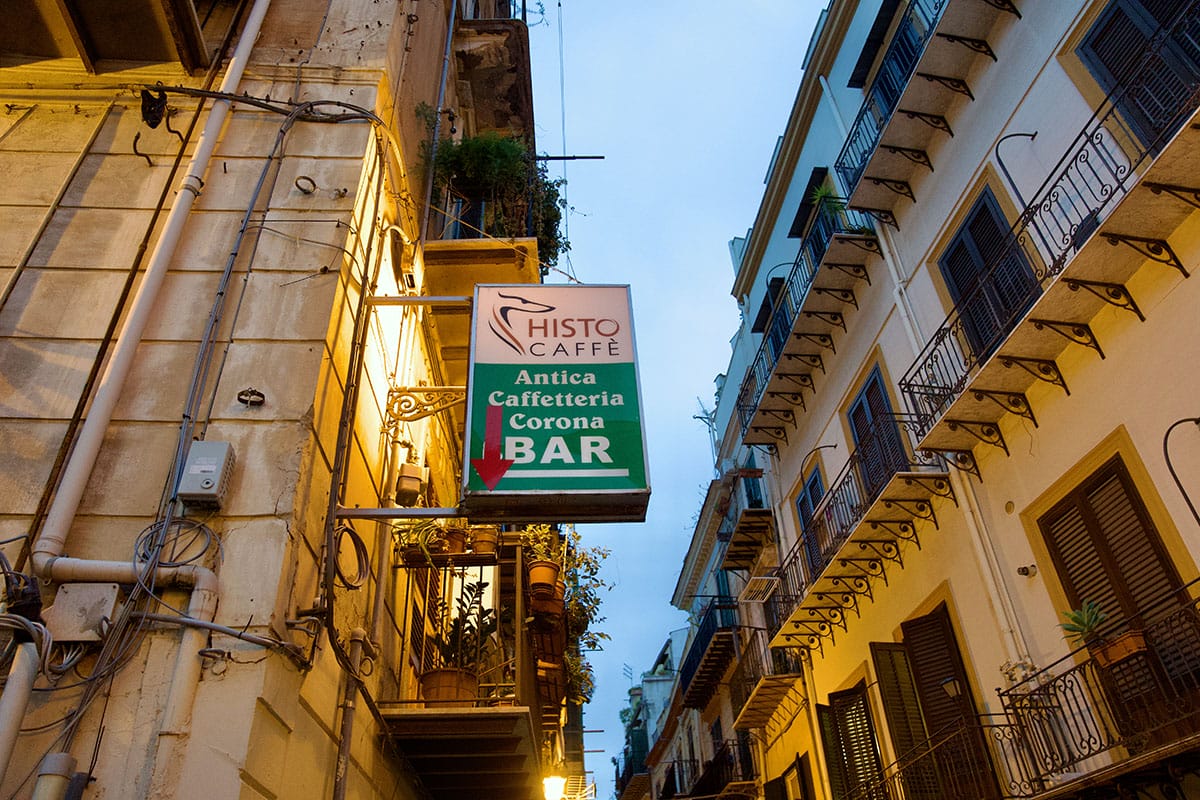 Walk through the charming backstreets of Palermo's old port area