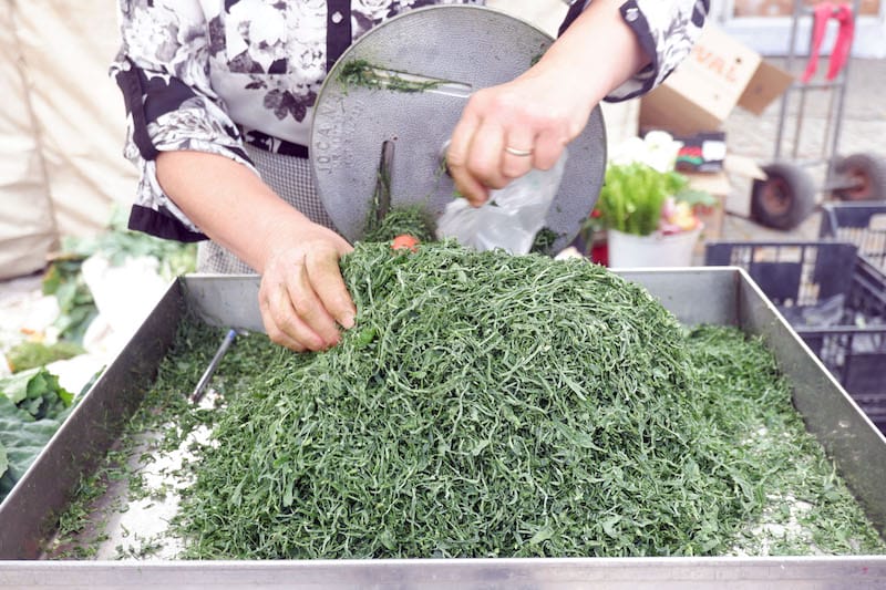 Kale, already sliced thin, is a crucial ingredient in caldo verde, Portgual’s most famous soup, photo by Cláudia Brandão Caldo Verde