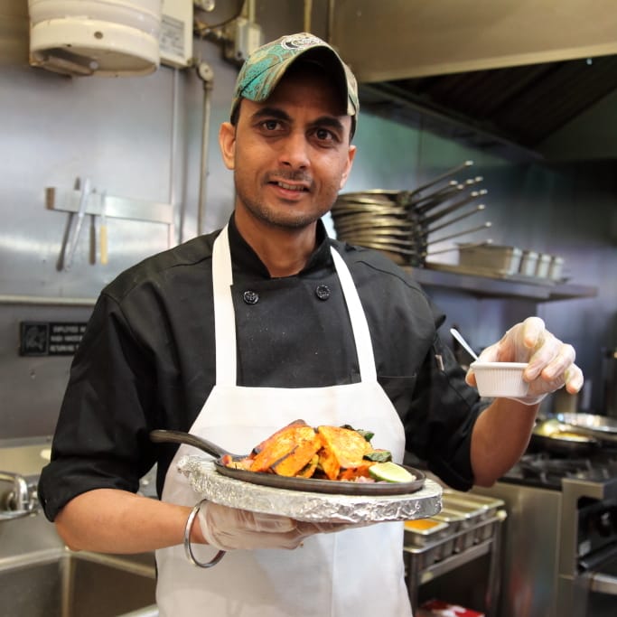 Chef Amrit Pal Singh with paneer tikka, photo by Dave Cook