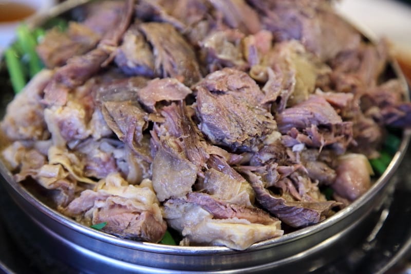 Black goat meat at Banggane, photo by Dave Cook