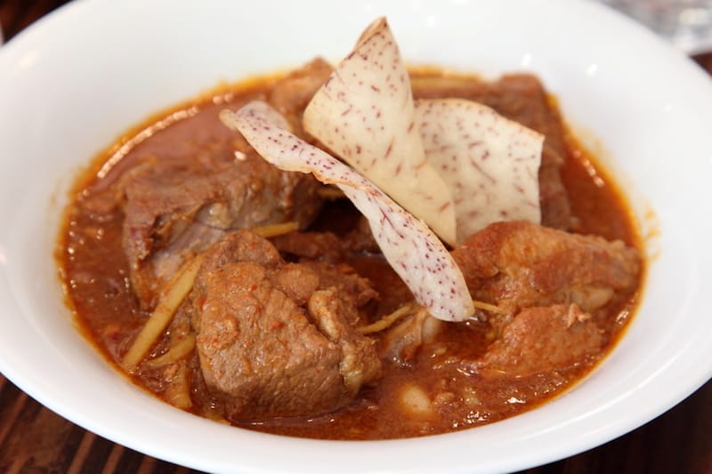 Kang hung ley, curried pork belly, at Lamoon, photo by Dave Cook