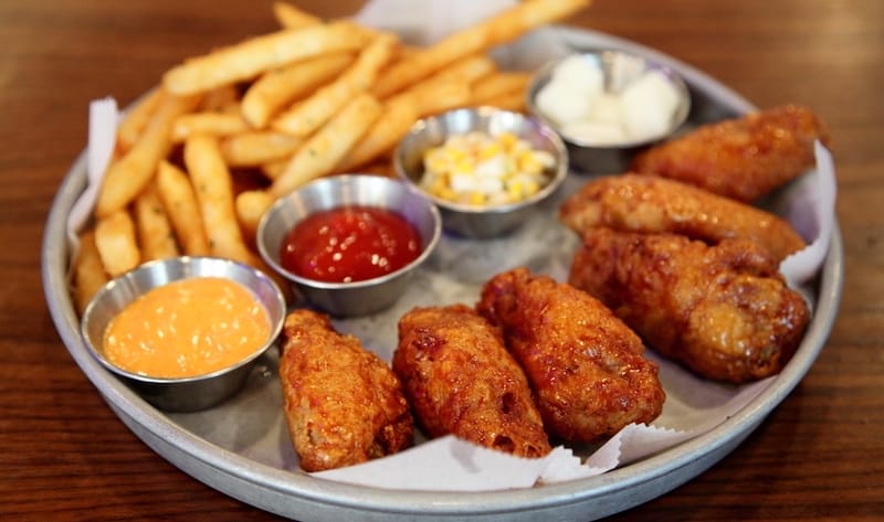 Chicken wings and fries, The Coop, Flushing, Queens, photo by Dave Cook