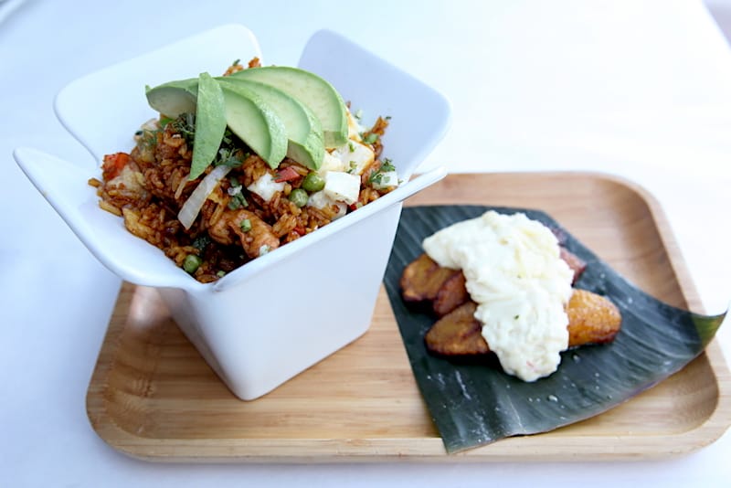 Chaulafan (served as if from a Chinese takeout container) and plantains, photo by Dave Cook