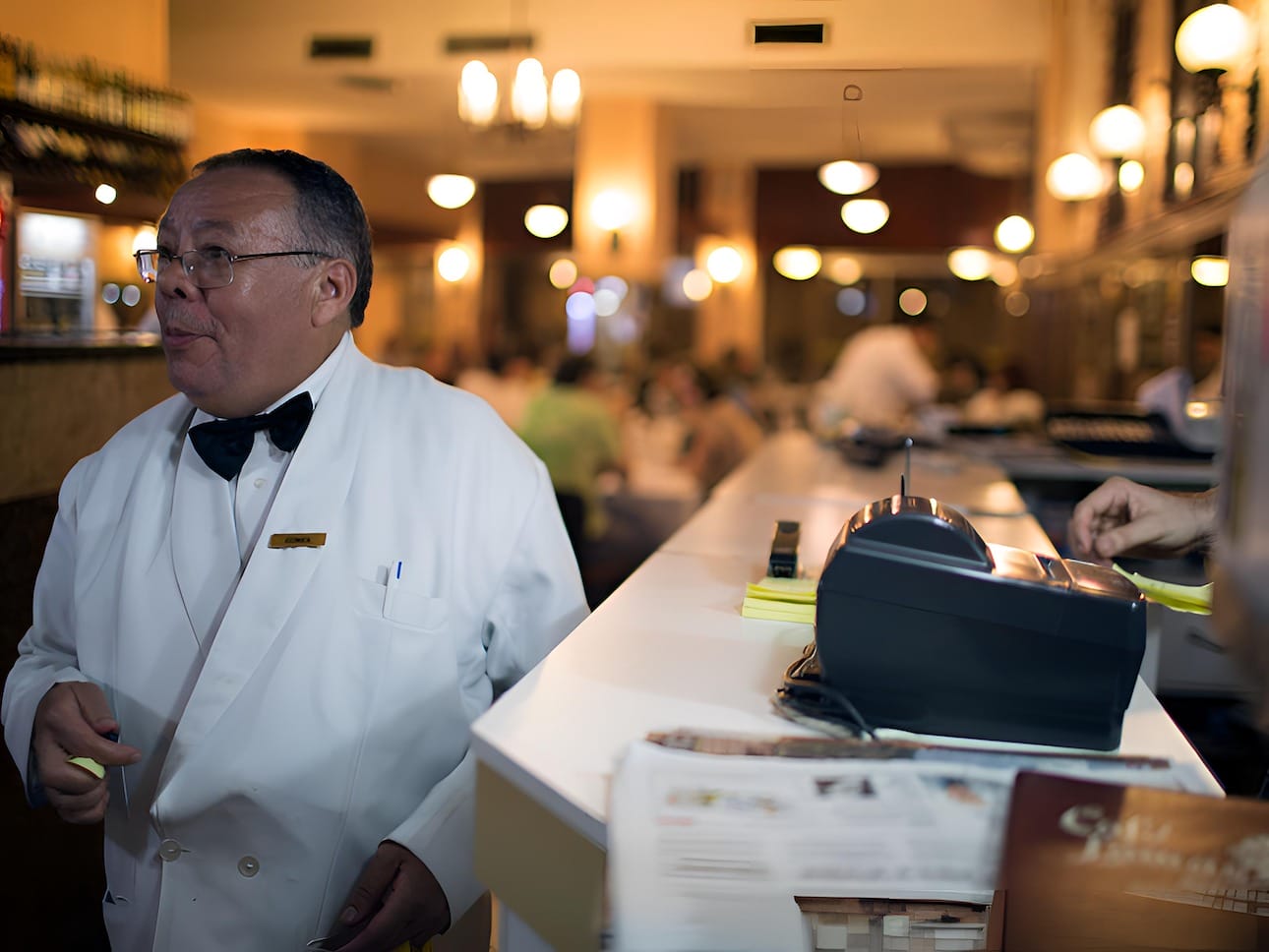 server at Café Lamas rio