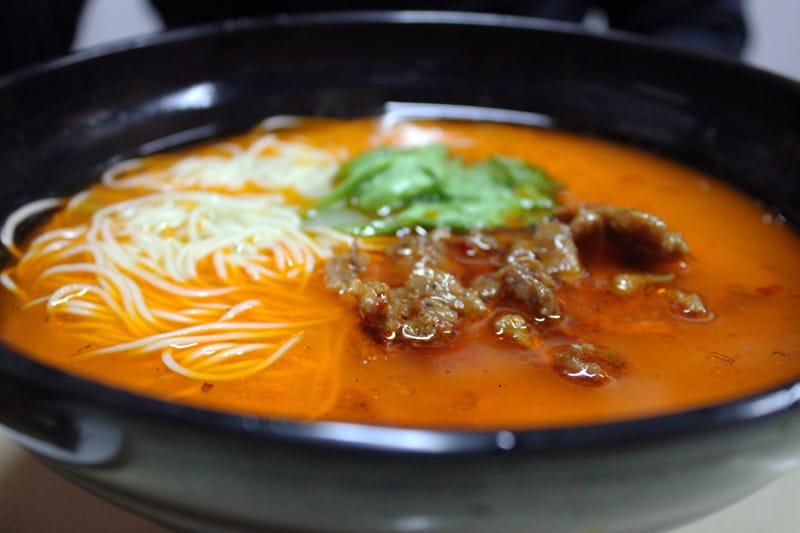 A steaming bowl of noodles at Ding Te Le, photo by Kyle Long best noodles former french concession