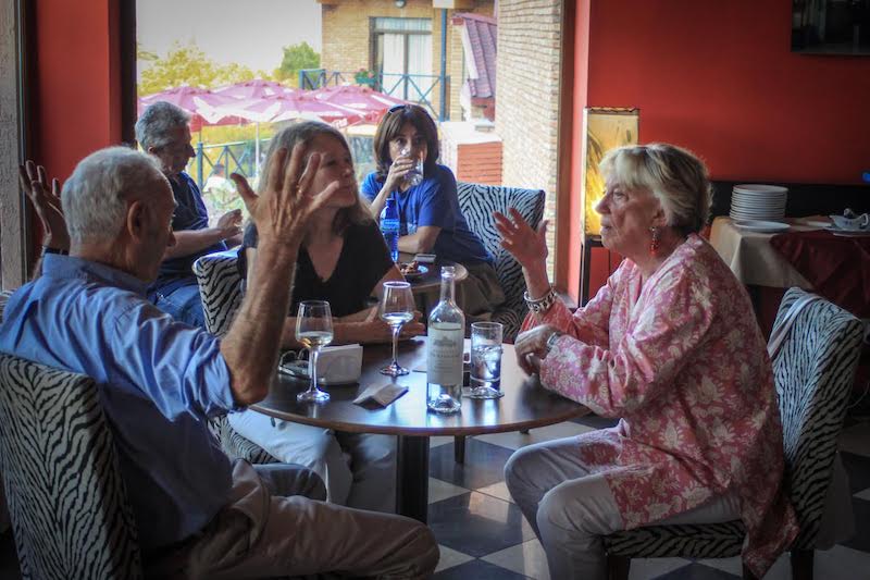 Betsy Haskell (r), the original owner of the hotel, enjoys happy hour, photo by Paul Rimple