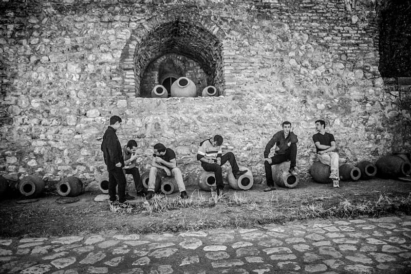 Kvevri, ceramic vessels used for storing wine, in a church courtyard in Georgia, phoot by Justyna Mielnikiewicz