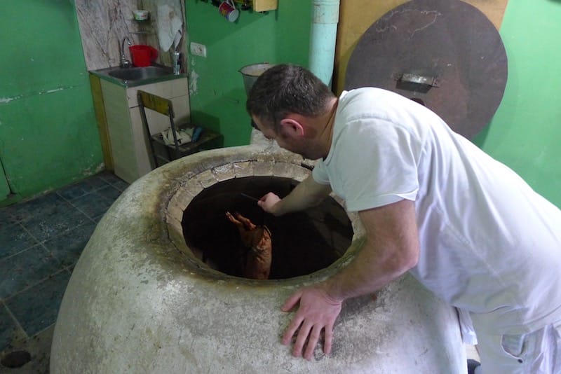 The tone oven used to roast the pig, photo by Clément Girardot