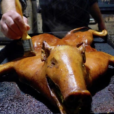 An oven-roasted piglet, photo by Clément Girardot