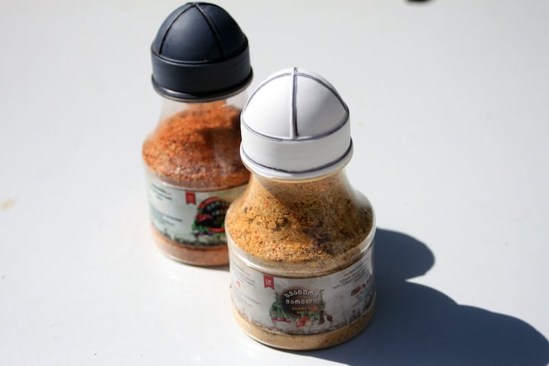 The Khardziani family’s packaged adjika and Svanetian Salt, with tradition Svan cap shaped tops, photo by Paul Rimple