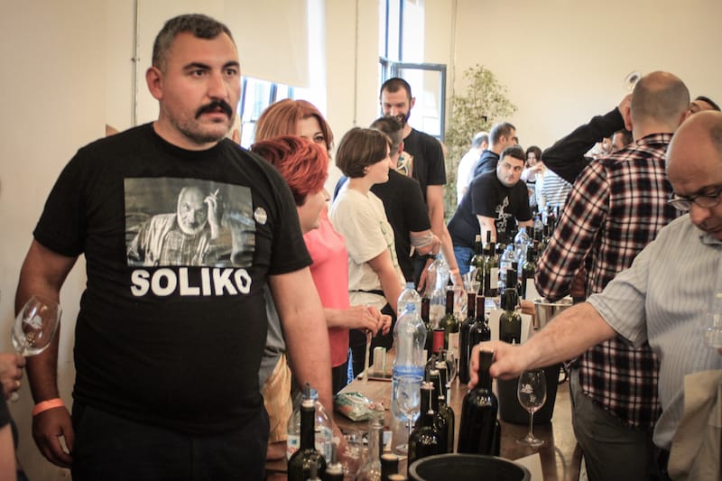 Zaza Gagua of Vino Martville wearing a T-shirt featuring Soliko Tsaishvili, a legendary winemaker who recently passed away, photo by Paul Rimple
