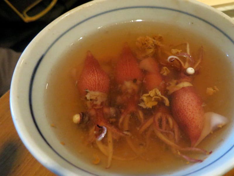 Den's baby squid oden, photo by Fran Kuzui