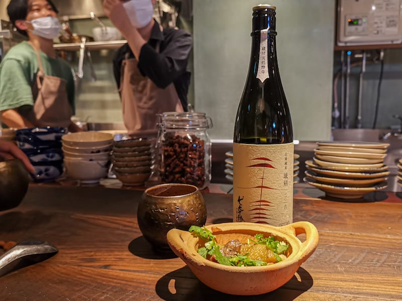 A small dish paired with sake at one of the stalls at The Restaurant in Eat Play Works, photo by Phoebe Amoroso