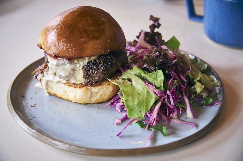 A simple cheeseburger with white cheddar and shibazuke ketchup, photo by Alex Fisher