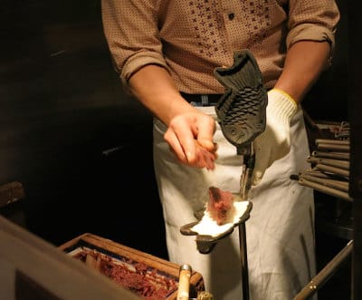 Filling the taiyaki mold at Naniwa Café, photo by Fran Kuzui