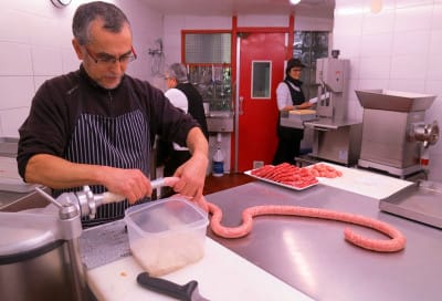 Making sausages at Can Solà, photo by Mireia Font