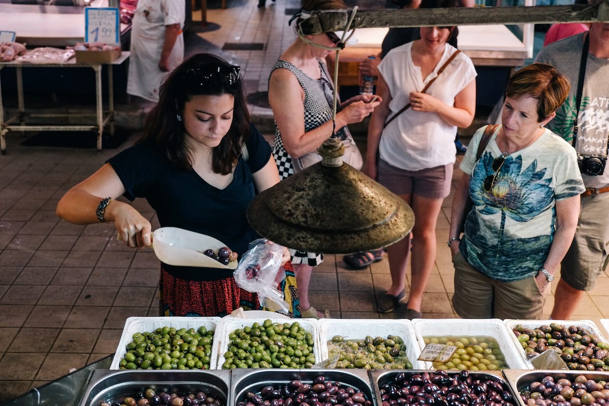 Explore Athens' biggest market for a crash course on local olives and much more
